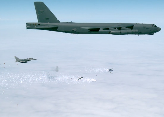 A frame from a video shows the PDU-5/B leaflet bomb activating and dispersing the leaflets. (U.S. Air Force image)