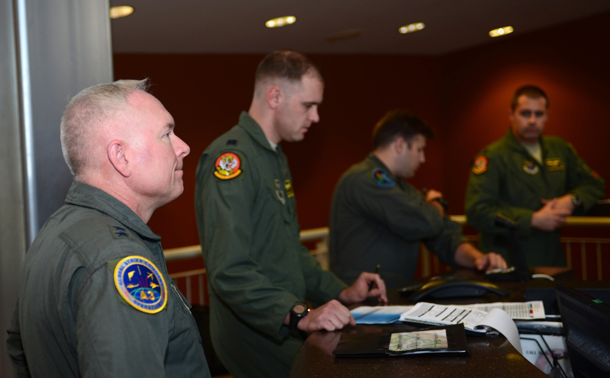 Maj. Gen. Ferdinand Stoss III, the Director of Operations and Communications for Air Force Global Strike Command, attends a step brief in preparation for his flight in a B-1 bomber at Ellsworth Air Force Base, S.D., July 12, 2017. Stoss flew a B-1 training mission to get firsthand experience in the aircraft, one of the many platforms he provides oversight for. (U.S. Air Force photo by Airman 1st Class Donald C. Knechtel)