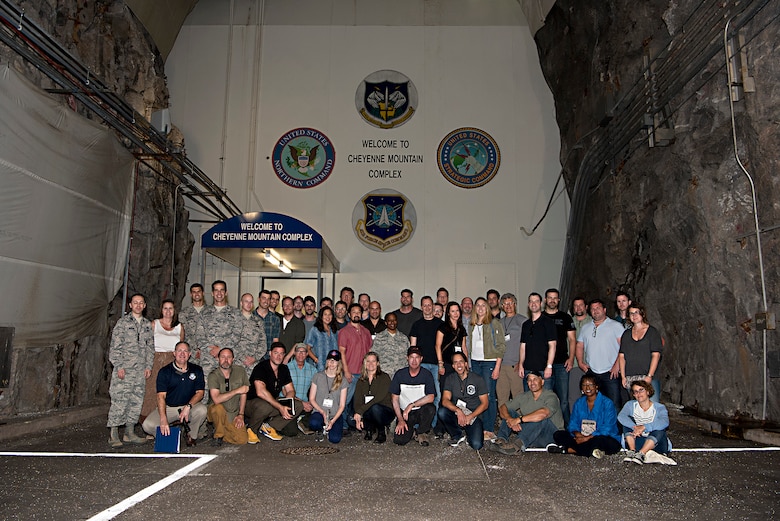 A group of Hollywood executives visit Cheyenne Mountain Air Force Station, Colo., for a tour of the complex, July 18, 2017. The tour was conducted as part of an outreach program to Hollywood screenwriters, producers and directors in an effort to give Hollywood an inside look into the Air Force space mission and ensure that any projects they produce can be represented accurately. (U.S. Air Force photo by Steve Kotecki)