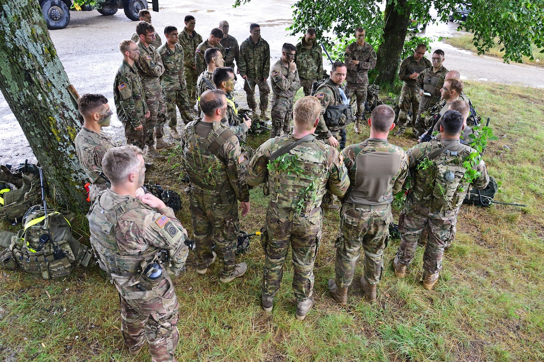Army paratroopers discuss training objectives during Exercise Rock Knight at Pocek Range in Postonja, Slovenia, July 24, 2017. Army photo by Paolo Bovo
