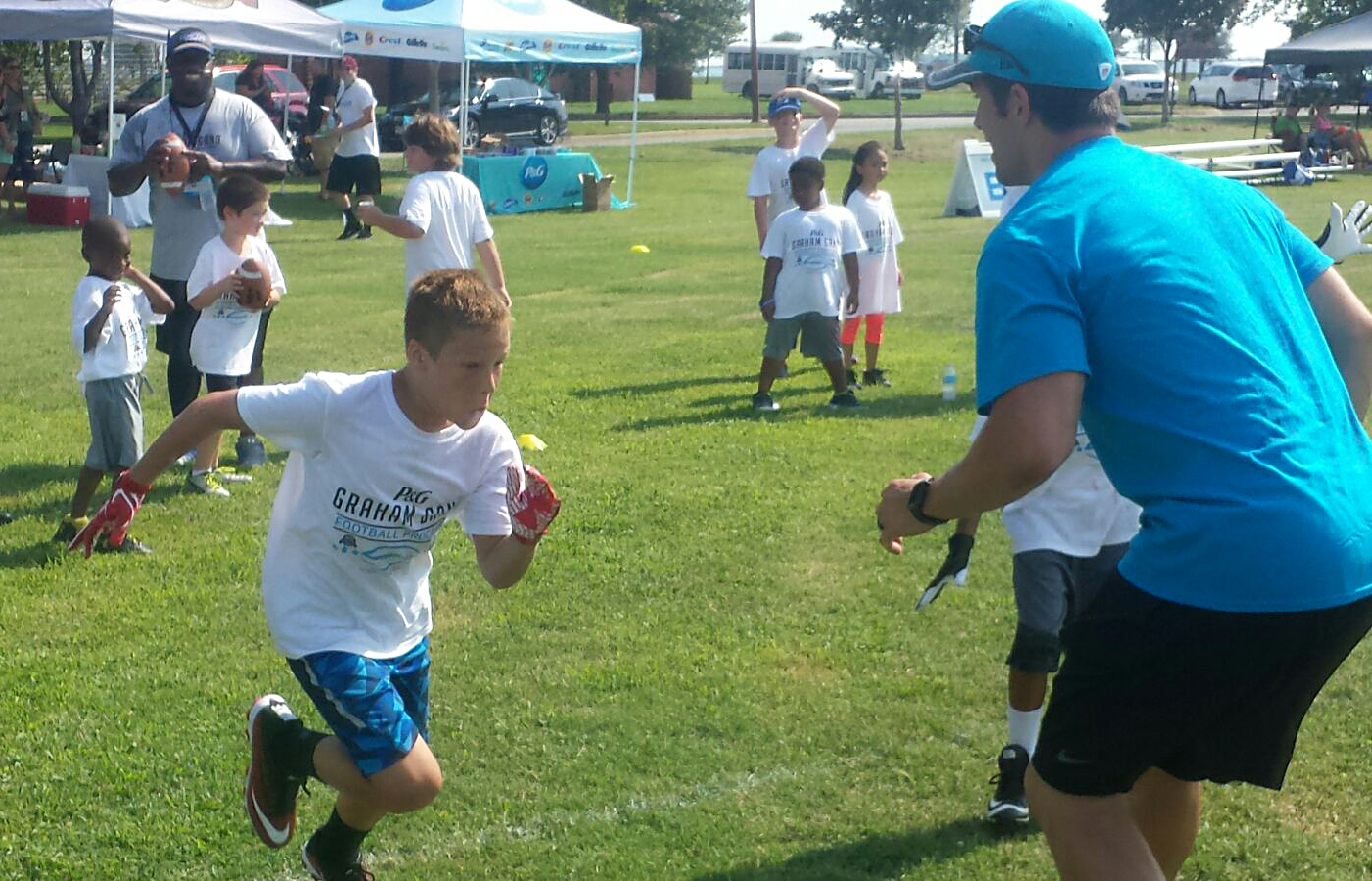 NFL player hosts military youth football camp