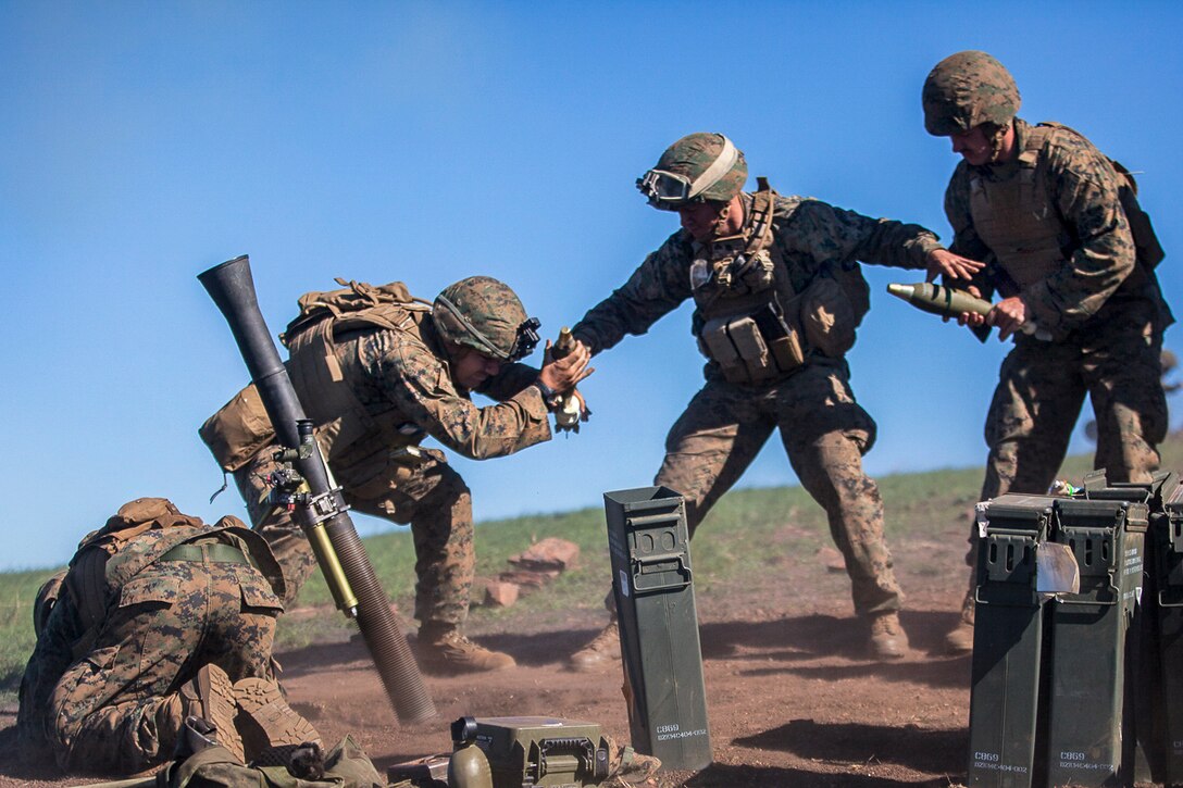Marines fire an 81 mm mortar during Exercise Talisman Saber 17 at Shoalwater Bay Training Area, Australia, July 21, 2017. The Marines are mortarmen assigned to Weapons Company, Battalion Landing Team, 3rd Battalion, 5th Marine Regiment. The biennial exercise aims to improve the interoperability between Australian and U.S. forces. Marine Corps photo by Lance Cpl. Stormy Mendez