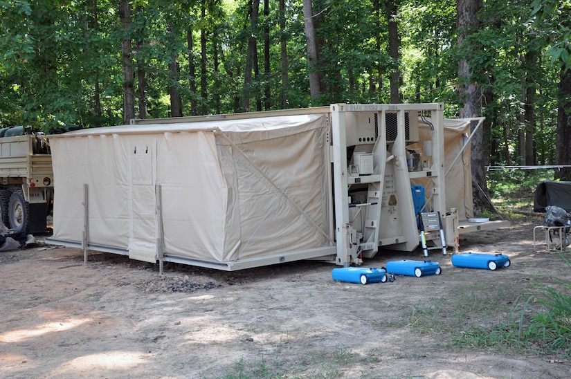 A Mobile Integrated Remains Collection System operated by the 311th Quartermaster Company, an Army Reserve unit out of Ramey Base, Puerto Rico, sits in a training site at Fort Pickett, Virginia, July 16, 2017. The Army Reserve Soldiers are participating in the 2017 Joint Mortuary Affairs Exercise along with active Army Soldiers, the Air Force and Marines.