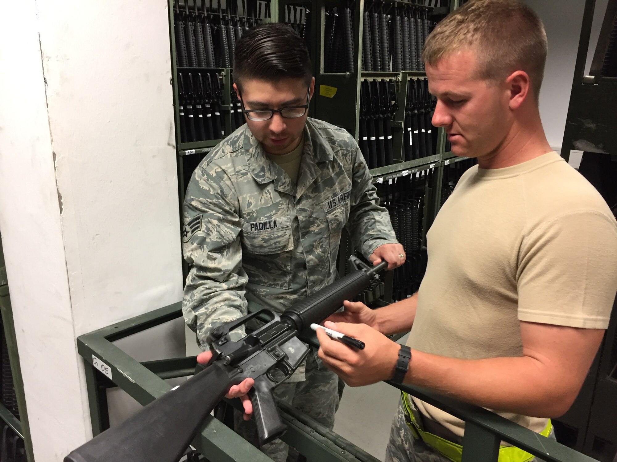 Senior Airman Thomas Crews, a supply specialist from the 927th Logistics Readiness Squadron, MacDill Air Force base, Florida, works alongside his active duty counterpart Senior Airman Daniel Padilla, 52nd Logistics Readiness Squadron, Spangdahlem, Germany. Citizen Airmen from the 927 LRS, traveled to Spangdahlem Air Base, Germany, to perform their annual training, July 7-23, 2017. (U.S. Air Force photo by Tech. Sgt. Peter Dean)