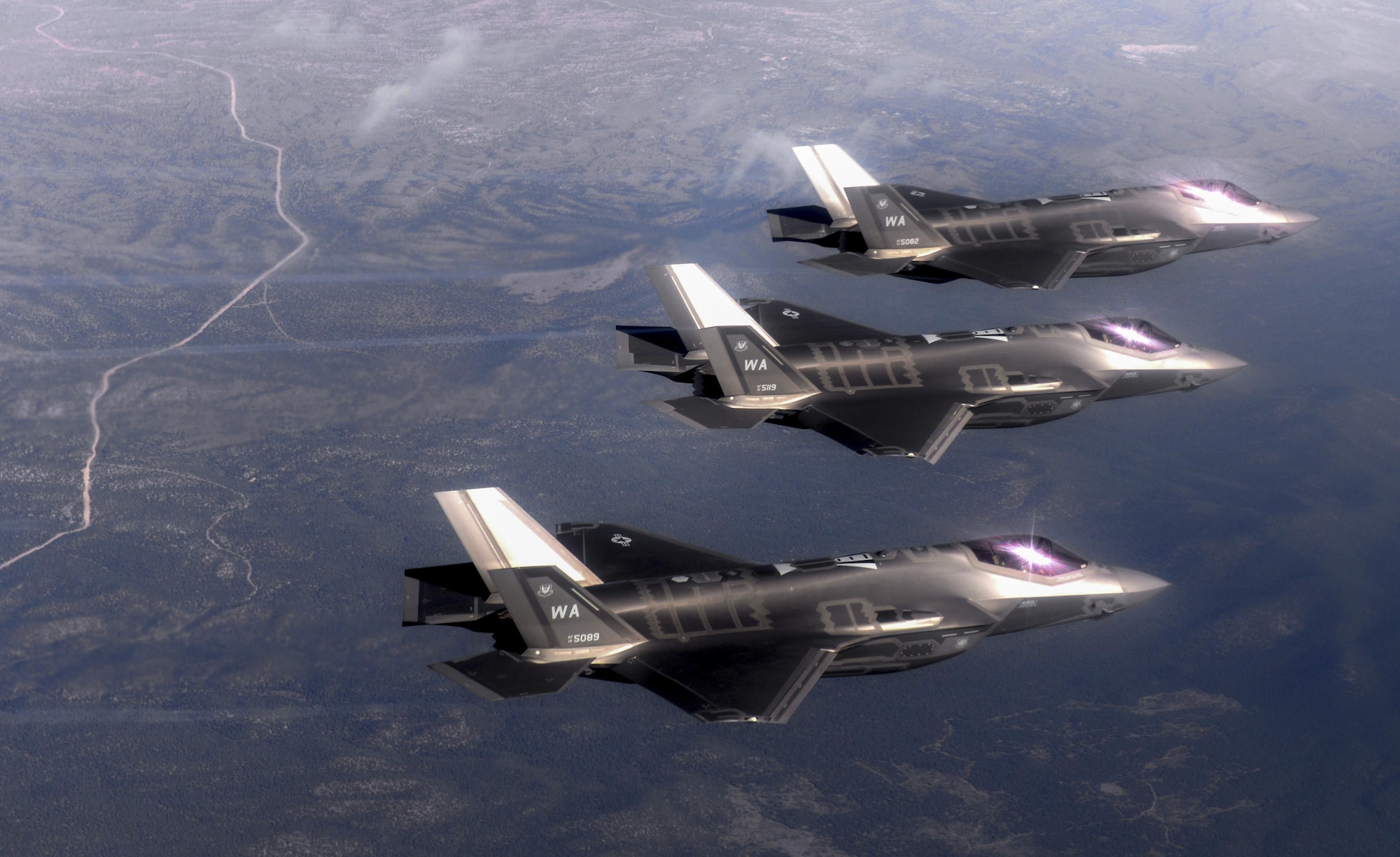 F-35 Lighting II fighter jets, assigned to the 6th Weapons Squadron, at Nellis Air Force Base, Nev., fly over the Nevada Test and Training Range July 10, 2017. The United States Air Force Weapons School teaches graduate-level instructor courses that provide the world's most advanced training in weapons and tactics employment to officers of the combat air forces and mobility air forces. (U.S. Air Force photo by Staff Sgt. Daryn Murphy/Released)