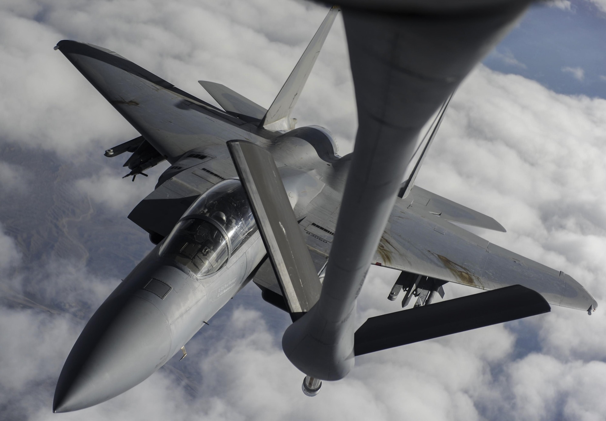 An F-15 fighter jet, assigned to the 433rd Weapons Squadron, at Nellis Air Force Base, Nevada, prepares for aerial refueling over the Nevada Test and Training Range, Nev., July 10, 2017. The United States Air Force Weapons School teaches graduate-level instructor courses that provide the world's most advanced training in weapons and tactics employment to officers of the combat air forces and mobility air forces. (U.S. Air Force photo by Senior Airman Kevin Tanenbaum/Released)