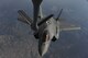 An F-35 Lightning II fighter jet, assigned to the 6th Weapons Squadron, at Nellis Air Force Base, Nev., flies to meet a KC-135 Stratotanker cargo aircraft assigned to the 509th Weapons Squadron, at Fairchild Air Force Base, Washington, boom for aerial refueling over the Nevada Test and Training Range, Nev., July 10, 2017. The United States Air Force Weapons School teaches graduate-level instructor courses that provide the world's most advanced training in weapons and tactics employment to officers of the combat air forces and mobility air forces. (U.S. Air Force photo by Senior Airman Kevin Tanenbaum/Released)