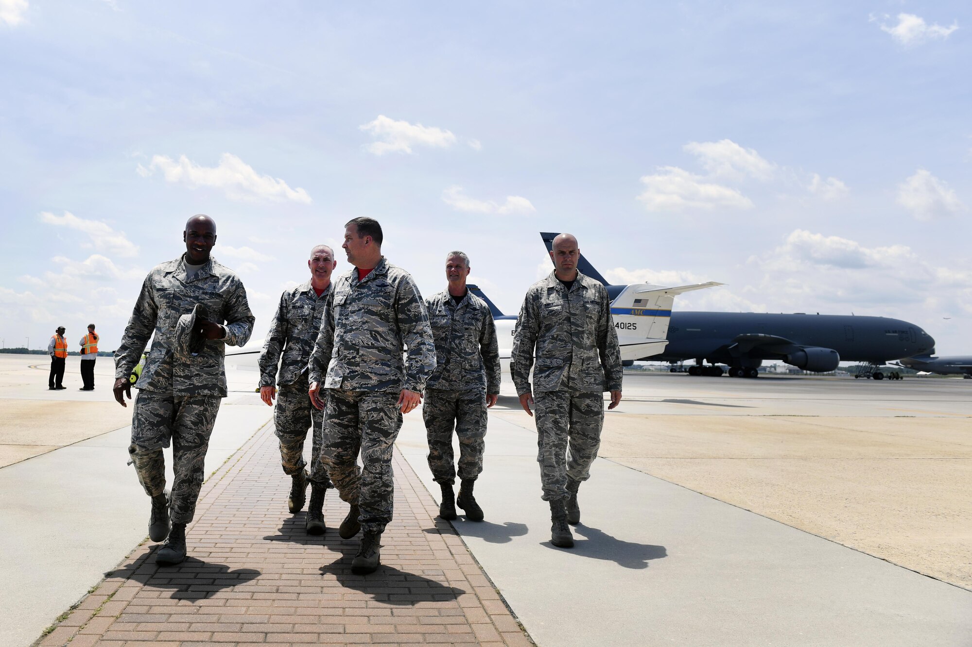 Leaders from Joint Base McGuire-Dix-Lakehurst, New Jersey, greet Chief Master Sgt. of the Air Force Kaleth O. Wright on the flightline here. As the Chief Master Sgt. of the Air Force, Wright travels from installation to installation, sharing his wealth of experience with Airmen from all walks of life. 