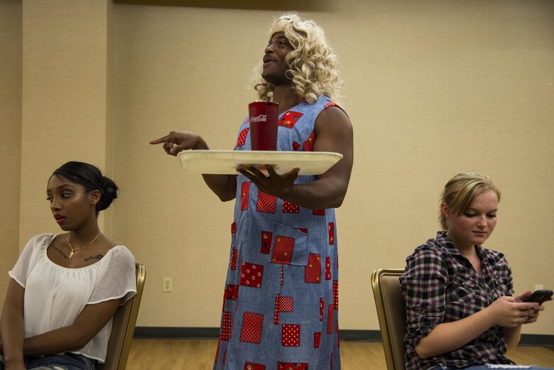 Airmen act out a scene in the play, “The Customer is Always Wrong,” at Moody Air Force Base, Ga., July 19, 2017. Every year Moody’s Thespian Club performs a theatrical production that brings together Airmen from around base. (U.S. Air Force photo by Airman 1st Class Erick Requadt)