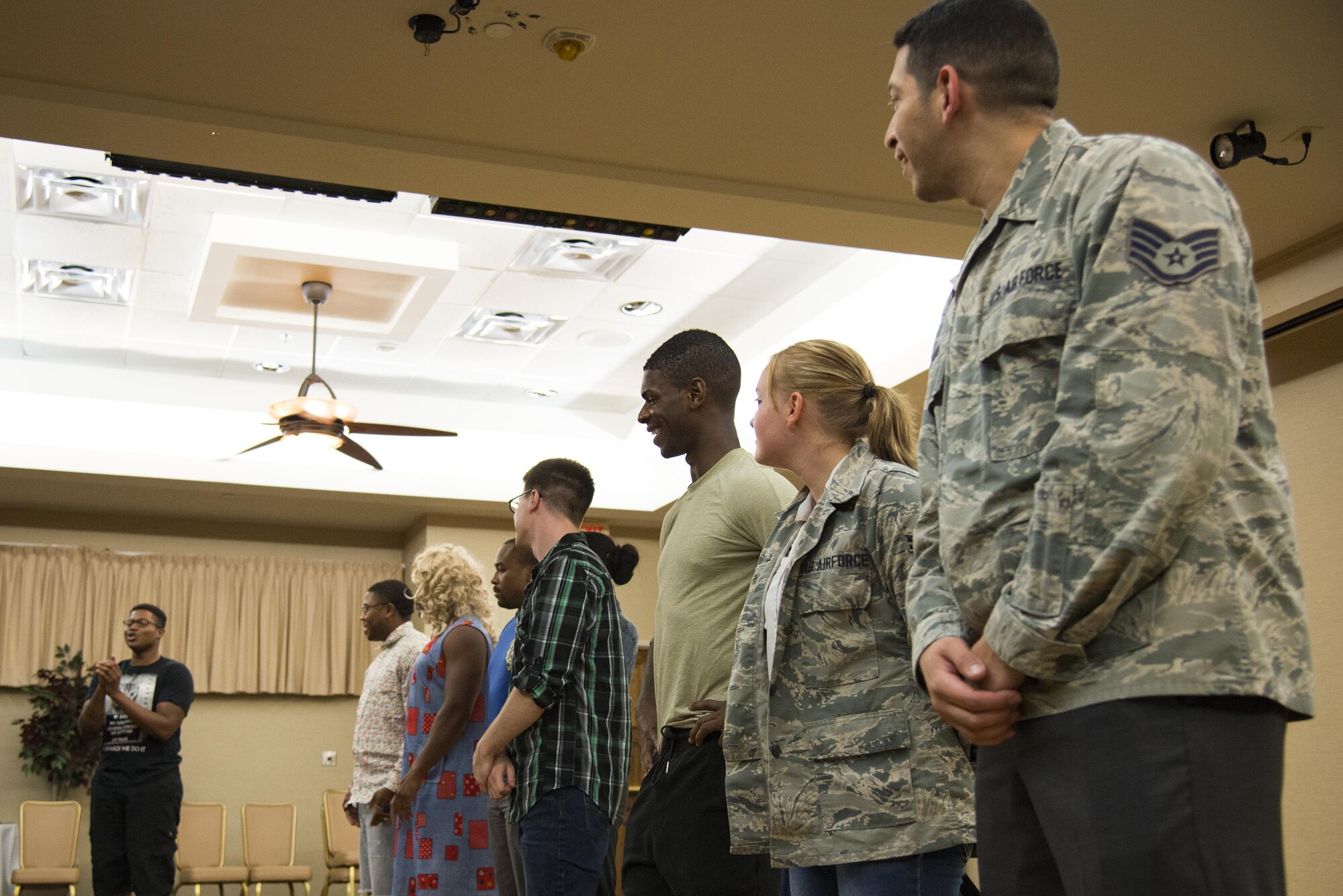 The Airmen cast in the play “The Customer is Always Wrong,” stand for their applause at Moody Force Base, Ga., July 19, 2017. Every year Moody’s Thespian Club performs a theatrical production that brings together Airmen from around base. (U.S. Air Force photo by Airman 1st Class Erick Requadt)