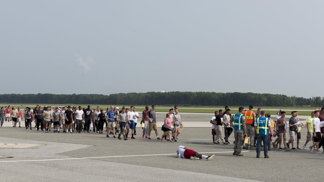 Team Dover Airmen role play as Open House spectators during a Major Accident Response Exercise July 22, 2017, on Dover Air Force Base, Del. The Thunder Over Dover Open House is scheduled for Aug. 26 and 27, 2017. (U.S. Air Force photo by Senior Airman Zachary Cacicia)