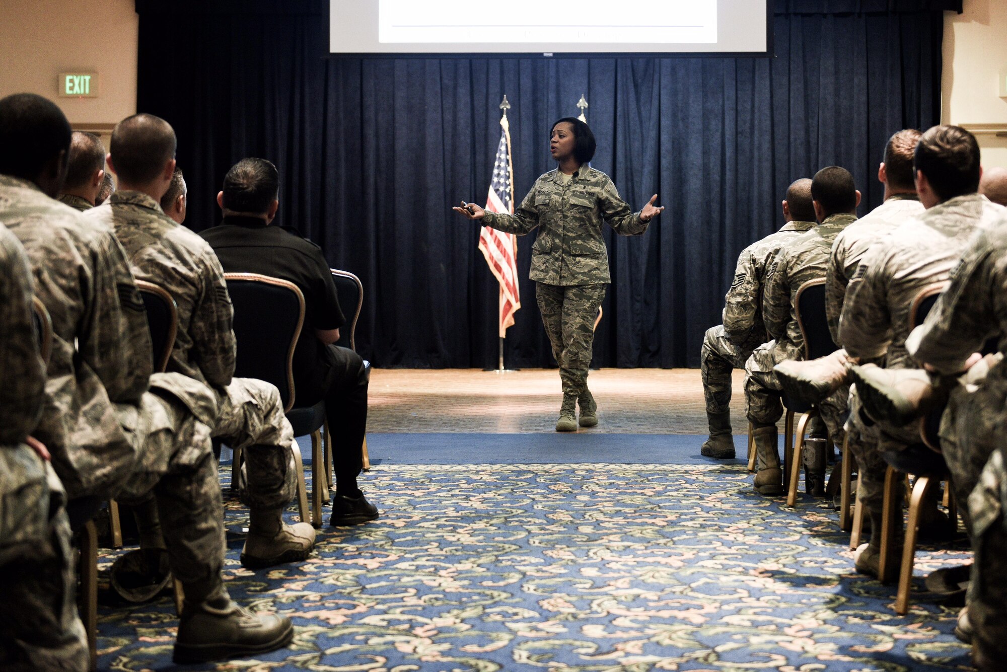 Chief Master Sgt. Diena Mosely, 30th SW command chief, speaks to Airmen during an All Call, July 25, 2017, Vandenberg Air Force Base, Calif. Accompanied by Col. Michael Hough, 30th Space Wing commander, the duo used their first official All Call to formally introduce themselves and their priorities to the wing. (U.S. Air Force photo by Senior Airman Ian Dudley/Released)