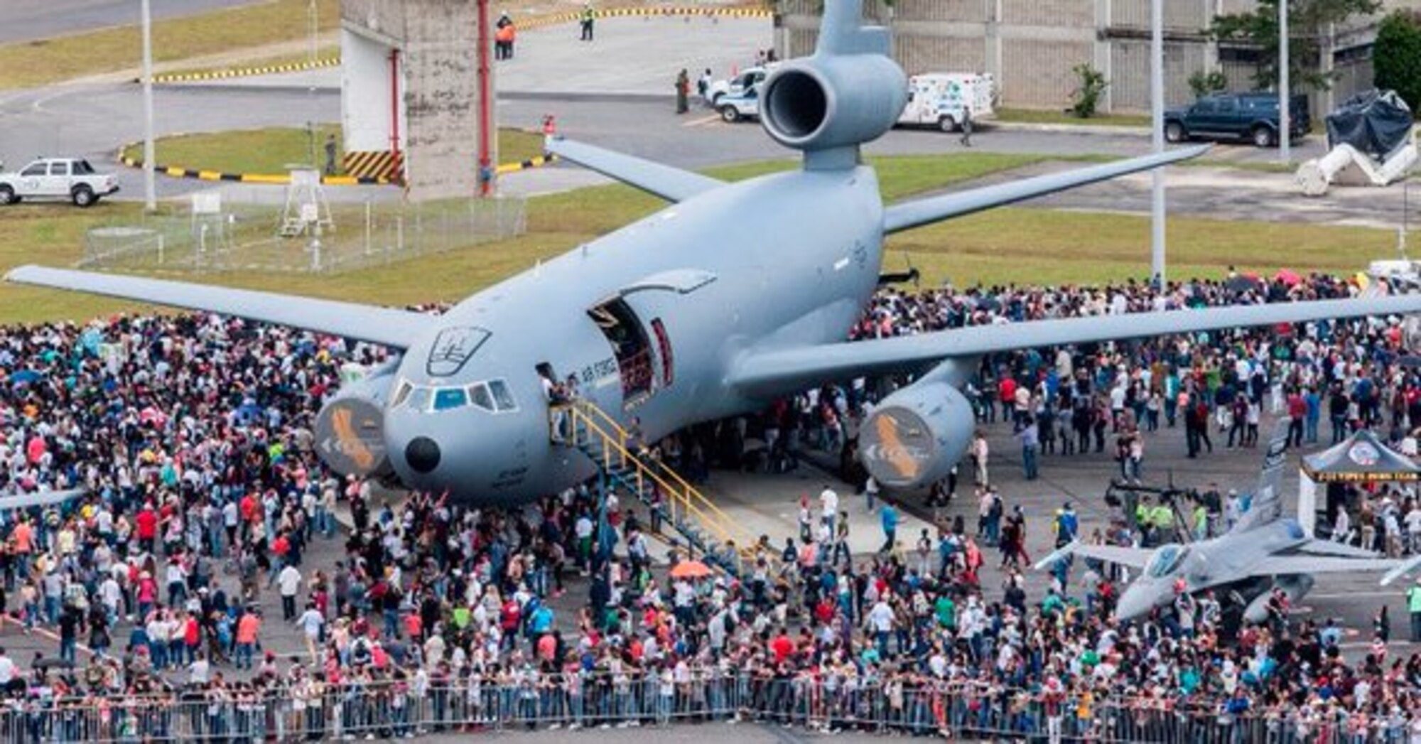 Guests tour various aircraft during Feria Aeronautica Internacional—Colombia 2017 in Rionegro, Colombia, July 14, 2017. The United States Air Force is participating in the four-day air show with two South Carolina Air National Guard F-16s as static displays, plus static displays of a KC-135, KC-10, along with an F-16 aerial demonstration by the Air Combat Command’s Viper East Demo Team. United States military participation in the air show provides an opportunity to strengthen our military-to-military relationships with regional partners and provides the opportunity to meet with our Colombian air force counterparts and facilitate interoperability, which can be exercised in future cooperation events such as exercises and training. (Courtesy Photo)