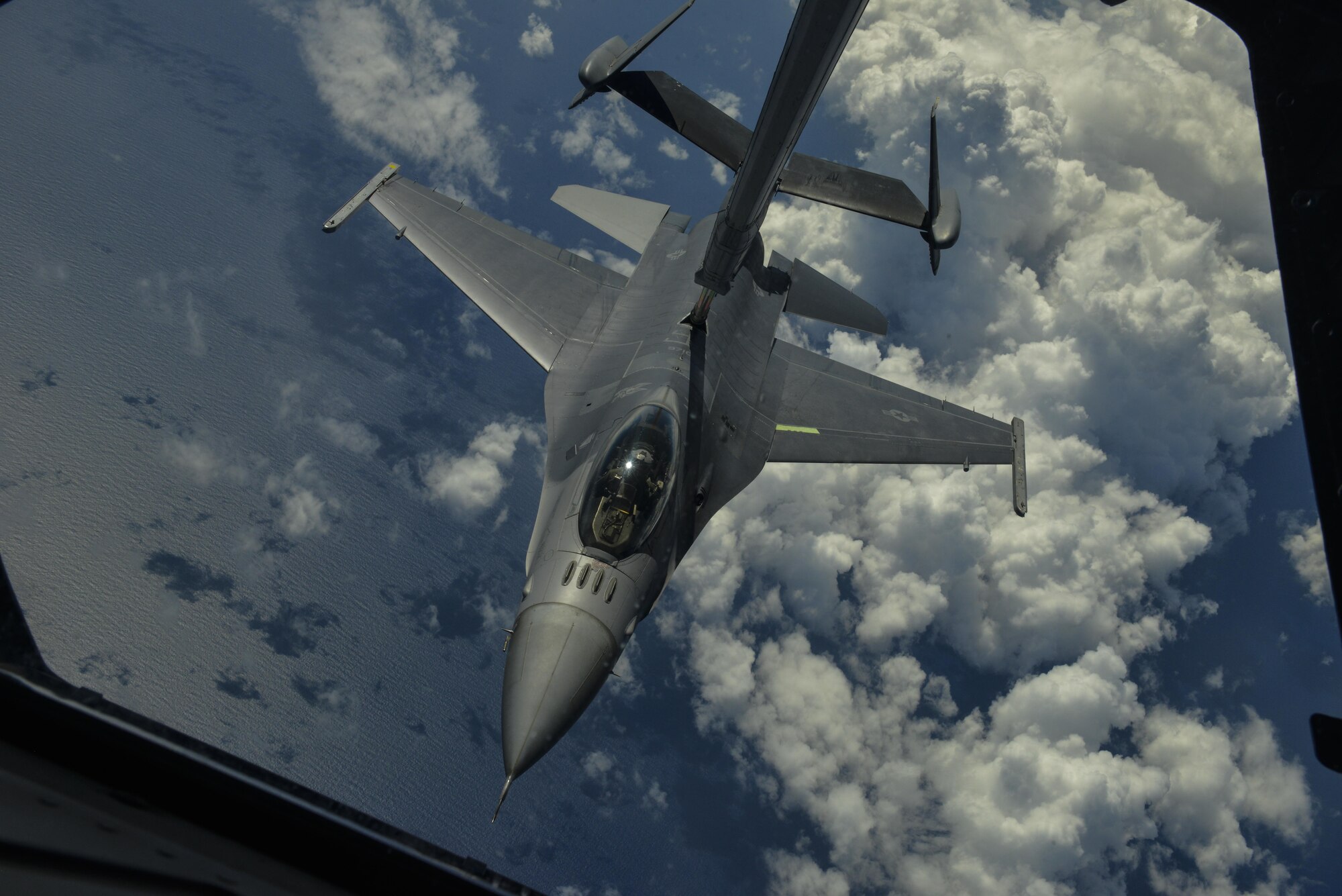 A KC-10 Extender from Travis Air Force Base, Calif., refuels an F-16 Fighting Falcon during Feria Aeronautica Internacional—Colombia 2017 in Rionegro, Colombia, July 14, 2017. The United States Air Force is participating in the four-day air show with two South Carolina Air National Guard F-16s as static displays, plus static displays of a KC-135, KC-10, along with an F-16 aerial demonstration by the Air Combat Command’s Viper East Demo Team. United States military participation in the air show provides an opportunity to strengthen our military-to-military relationships with regional partners and provides the opportunity to meet with our Colombian air force counterparts and facilitate interoperability, which can be exercised in future cooperation events such as exercises and training. (Courtesy Photo)