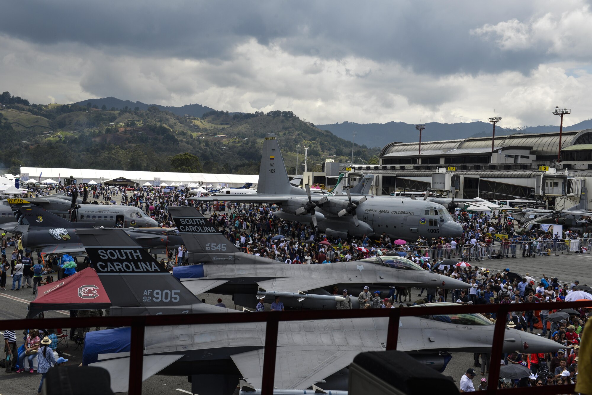 Guests tour various aircraft during Feria Aeronautica Internacional—Colombia 2017 in Rionegro, Colombia, July 14, 2017. The United States Air Force is participating in the four-day air show with two South Carolina Air National Guard F-16s as static displays, plus static displays of a KC-135, KC-10, along with an F-16 aerial demonstration by the Air Combat Command’s Viper East Demo Team. United States military participation in the air show provides an opportunity to strengthen our military-to-military relationships with regional partners and provides the opportunity to meet with our Colombian air force counterparts and facilitate interoperability, which can be exercised in future cooperation events such as exercises and training. (Courtesy Photo)