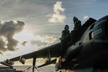 PACIFIC OCEAN – Cpl. Luis Soldono and Cpl. Garnet Burgess avionic technicians with the 15th Marine Expeditionary Unit conduct maintenance to an AV-8B Harrier aboard the amphibious assault ship USS America (LHA-6), July 16, 2017. The 15th Marine Expeditionary Unit and America Amphibious Ready Group Team is currently deployed to the 3rd, 5th and 7th fleet areas of responsibility as a crisis response and contingency force (U.S. Marine Corps photo by Lance Cpl. Jacob Pruitt)