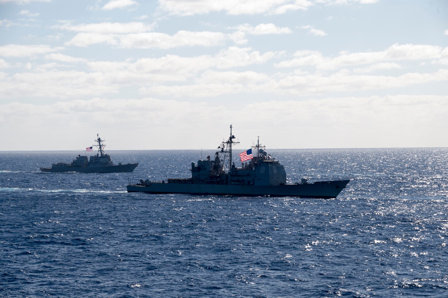 170722-N-RU971-438 CORAL SEA (July 22, 2017) The guided-missile cruiser USS Shiloh (CG 67) and the guided-missile destroyer USS Sterrett (DDG 104) steam in formation during a multi-ship group sail during Talisman Saber 17. Talisman Saber is a biennial U.S.-Australian bilateral exercise held off the coast of Australia meant to achieve interoperability and strengthen the U.S.-Australian alliance. (U.S. Navy photo by Mass Communication Specialist 2nd Class Cameron McCulloch/Released)