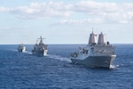 170722-N-YG104-011 CORAL SEA (July 22, 2017) The amphibious transport dock USS Green Bay (LPD 20), the dock landing ship USS Ashland (LSD 48) and a Royal Australian Navy replenishment oiler HMAS Success (OR 304) steam along as ships from the U.S., Australia, and New Zealand sail together in formation to culminate Talisman Saber 17. Talisman Saber is a biennial U.S. bilateral exercise held off the coast of Australia meant to achieve interoperability and strengthen the U.S.-Australia alliance. (U.S. Navy photo by Mass Communication Specialist 2nd Class Sarah Villegas/Released)