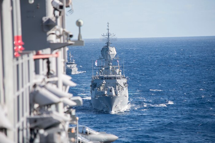 170722-N-YG104-024 CORAL SEA (July 22, 2017) The Royal Australian Navy Anzac class frigate HMAS Toowoomba (FFH 156) steams behind the amphibious assault ship USS Bonhomme Richard (LHD 6) as ships from the U.S., Australia, and New Zealand sail together in formation to culminate Talisman Saber 17. Talisman Saber is a biennial U.S. bilateral exercise held off the coast of Australia meant to achieve interoperability and strengthen the U.S.-Australia alliance. (U.S. Navy photo by Mass Communication Specialist 2nd Class Sarah Villegas/Released)