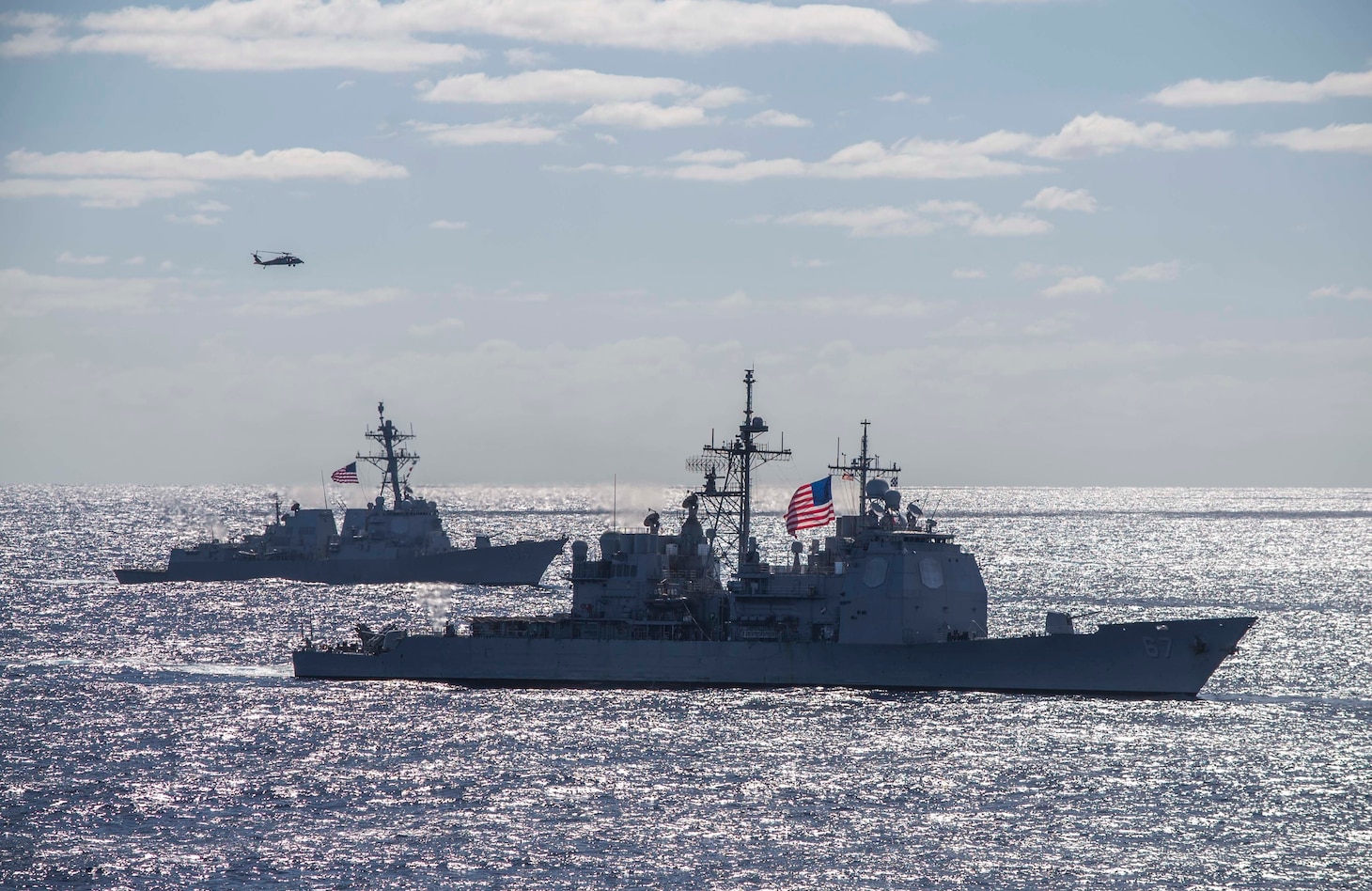 170722-N-YG104-031 CORAL SEA (July 22, 2017) The Ticonderoga-class guided missile destroyer USS Shiloh (CG 67) and the Arleigh-Burke class guided missile destroyer USS Sterett (DDG 104) steam along as ships from the U.S., Australia, and New Zealand sail together in formation to culminate Talisman Saber 17. Talisman Saber is a biennial U.S. bilateral exercise held off the coast of Australia meant to achieve interoperability and strengthen the U.S.-Australia alliance. (U.S. Navy photo by Mass Communication Specialist 2nd Class Sarah Villegas/Released)
