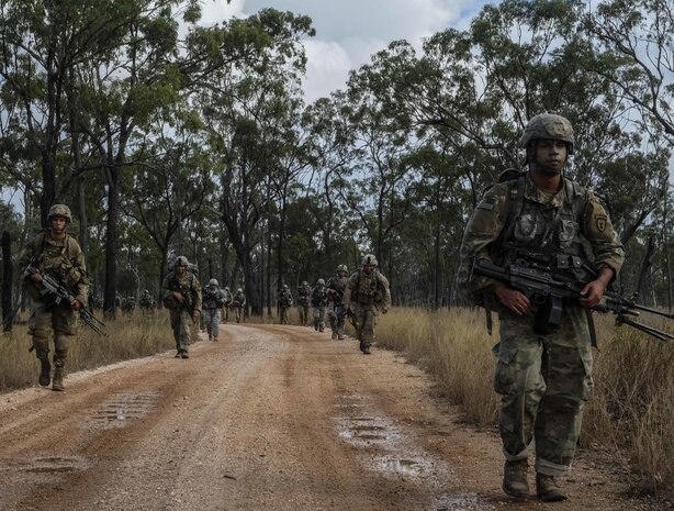 6th Brigade Engineer Battalion, 4th Infantry Brigade Combat Team, 25th Infantry Division paratroopers move to set up blocking positions during Exercise Talisman Saber in Shoalwater Bay Training Area, Australia July 14. (U.S. Army Photo by Staff Sgt. Daniel Love)