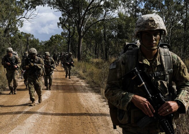 6th Brigade Engineer Battalion, 4th Infantry Brigade Combat Team, 25th Infantry Division paratroopers move to set up blocking positions during Exercise Talisman Saber in Shoalwater Bay Training Area, Australia July 14. (U.S. Army Photo by Staff Sgt. Daniel Love)