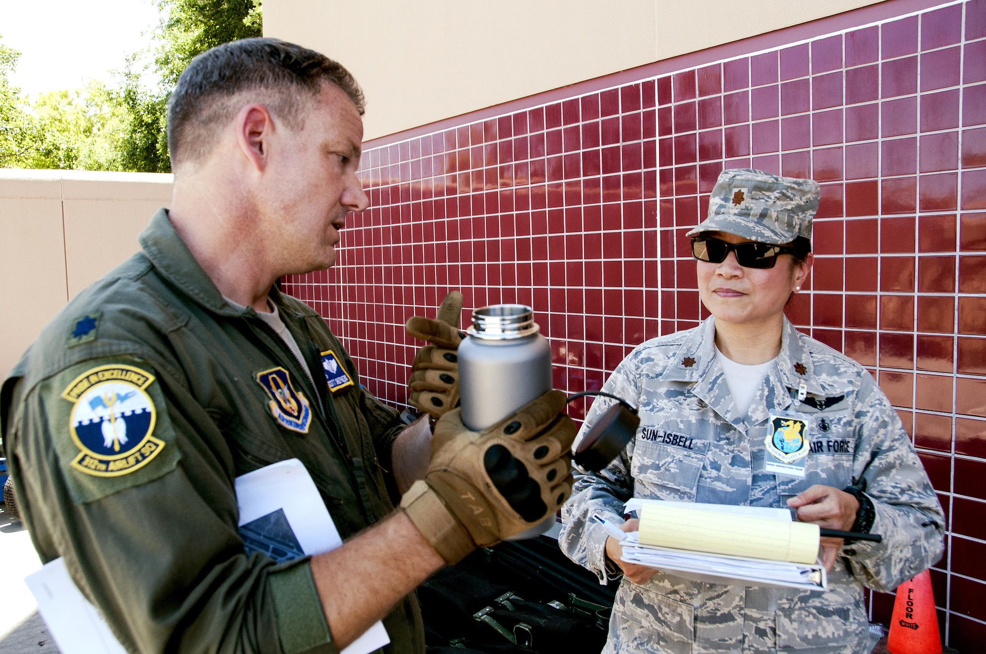 Lt. Col. Scott Shepard, 349th Aeromedical Staging Squadron flight surgeon, is interviewed by Maj. Theresa Sun-Isbell, 349th ASTS wing inspection team lead, as part of a unit evaluation inspection for Patriot Wyvern at Travis Air Force, Cali., on July 22, 2017.  The 349th ASTS members had one hour to set up the En-Route Patient Staging Facility and communications. They accomplished their task in less than 30 minutes. (U.S. Air Force photo by Staff Sgt. Daniel Phelps)