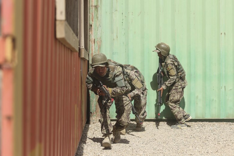 Afghan National Army soldiers with 2nd Kandak, 4th Brigade, 215th Corps conduct military operations in urban terrain training at Camp Shorabak, Afghanistan, July 7, 2017. Approximately 600 soldiers with the unit graduated from an eight-week operational readiness cycle July 24 with assistance from U.S. Marines assigned to Task Force Southwest. The ORC is designed to bolster its students’ warfighting capabilities as a means to defeat insurgency and enhance security throughout the region. (U.S. Marine Corps photo by Sgt. Lucas Hopkins)
