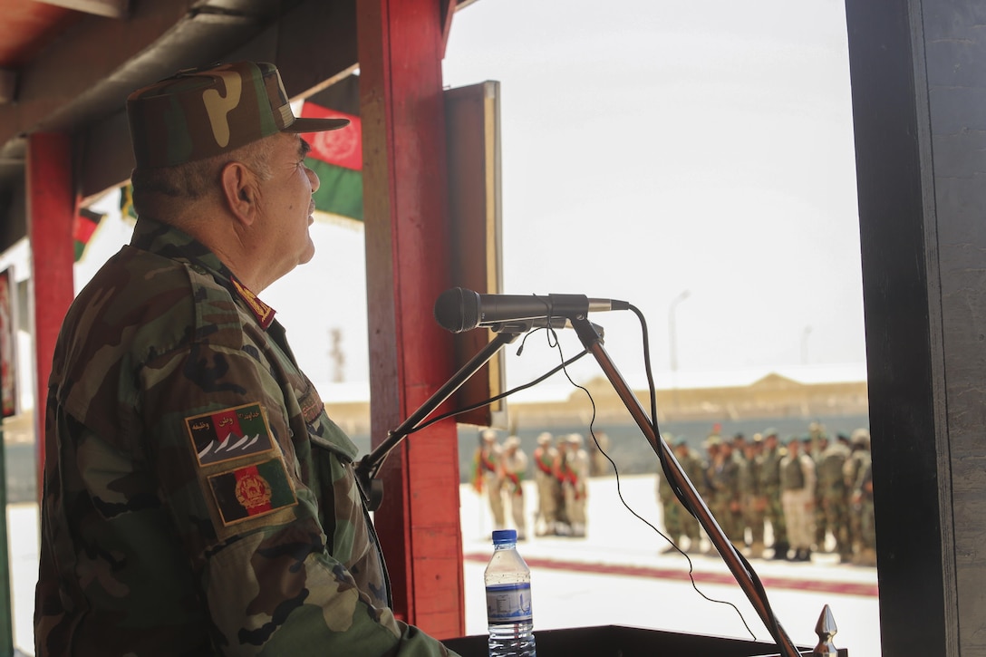 Afghan National Army Col. Shahwali Zazai, the commanding officer of the Helmand Province Regional Military Training Center, addresses soldiers with 2nd Kandak, 4th Brigade, 215th Corps during a graduation ceremony at Camp Shorabak, Afghanistan, July 24, 2017. The event concluded the unit’s operational readiness cycle, an eight-week training program designed to enhance their warfighting capabilities in order to promote security and stability throughout the region. (U.S. Marine Corps photo by Sgt. Lucas Hopkins)