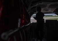 A Japan Air Self-Defense Force CH-47J crew chief assigned to the Air Reserve Wing, Flight Group Misawa Helicopter Airlift Squadron, conducts post-flight procedures upon arriving at Chitose Air Base, Japan, July 21, 2017. The ARW is located at JASDF Iruma Air Base, Japan, near the north of western Tokyo. The CH-47J was providing cargo to Chitose AB, which gave Pacific Air Forces’ F-16 Demonstration Team members the opportunity to use this method of transportation. (U.S. Air Force Staff Sgt. Deana Heitzman)