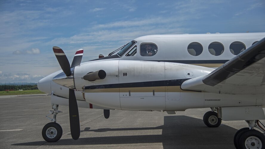 U.S. Navy Lt. Christopher Danielczyk, Naval Air Facility Misawa UC-12F Huron pilot, finalizes pre-flight procedures prior to take off at Chitose Air Base, Japan, July 24, 2017. In the past, Reeves and his team have transported the Pacific Air Forces’ F-16 Demonstration Team to other U.S. and foreign military bases in Japan and the Republic of Korea. (U.S. Air Force Staff Sgt. Deana Heitzman) 