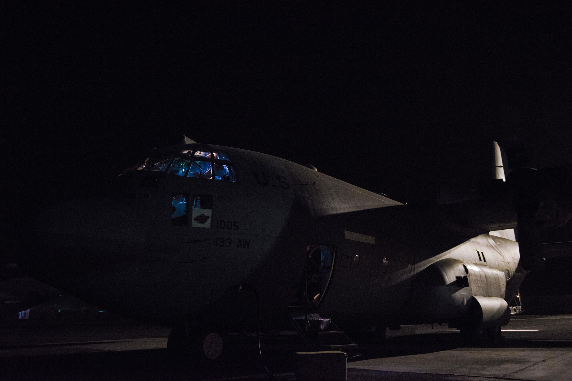 Pilots with the 737th Expeditionary Airlift Squadron conduct pre-flight checks in the cockpit of a C-130H Hercules before performing a combat mission at an undisclosed location in Southwest Asia, July 14, 2017. Air National Guardsmen and their aircraft, deployed in support of Combined Joint Task Force – Operation Inherent Resolve, execute daily airlift missions out of one of the busiest air bases in the U.S. Air Forces Central Command area of responsibility. (U.S. Air Force photo by Tech. Sgt.  Jonathan Hehnly)