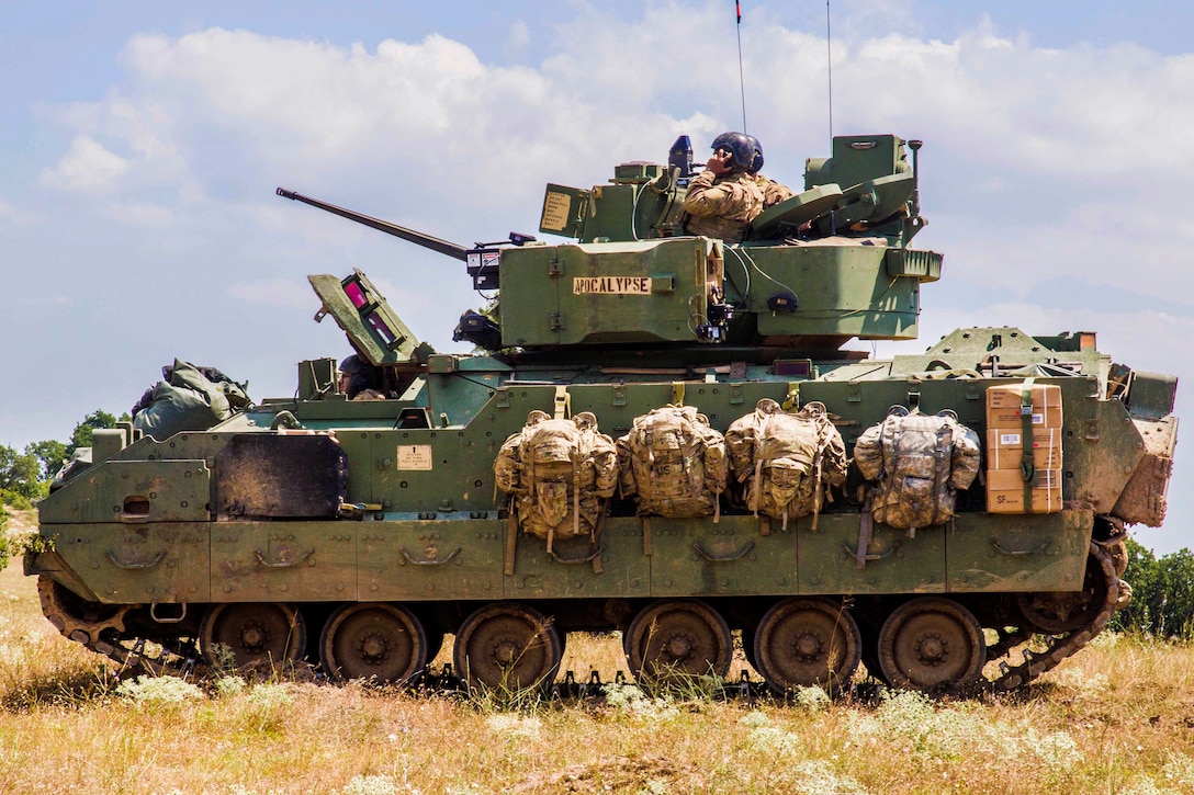 Soldiers maneuver a Bradley fighting vehicle during combined live-fire exercise Peace Sentinel in Koren, Bulgaria, July 19, 2017. The exercise is part of Saber Guardian 17. The soldiers are assigned to the 4th Infantry Division’s 1st Battalion, 8th Infantry Regiment. Army photo by Spc. Thomas Scaggs