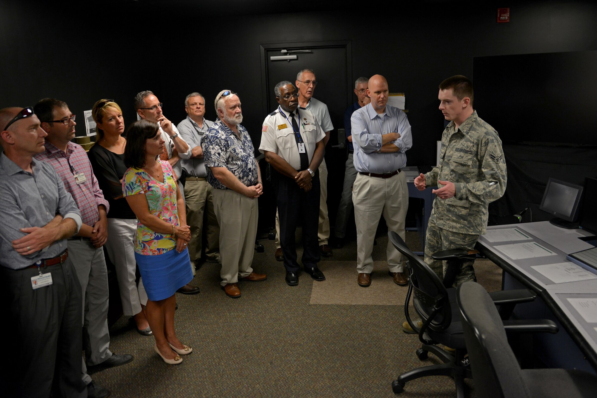 McLeod Physician Leadership Academy members listen to a brief about air traffic controller training during a base tour at Shaw Air Force Base, S.C., July 21, 2017. Airmen from the air traffic control tower and the weapons standardization flight provided information about their jobs and their training to the physicians during the tour. (U.S. Air Force photo by Airman 1st Class Destinee Sweeney)