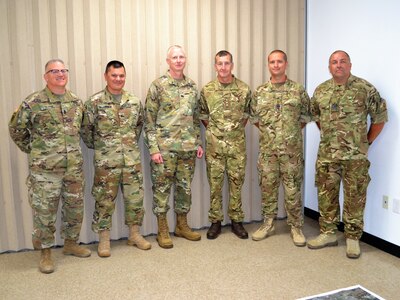 Command Sgt. Maj. Herman Luedthe, Transportation Surface Brigade command sergeant major, Col. Steven McLaughlin, 1394th TN BDE commander, Brig. Gen. David Elwell, 311th Expeditionary Sustainment Command commanding general and Senior Commander of the Combat Support Training Exercise, British Soldier Capt. Mark Cowley, 165th Port and Maritime Regiment RLC., 165th Port and Maritime Regiment RLC, and Warrant Officers Steve Cooper and Tony Houghton, traveled to Southern California for the Big Logistics-Over-the-Shore West 2017 at Camp Pendleton, for joint operations with the United States Navy and U.S Marine Corp, during the month of July.