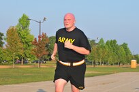 U.S. Army Reserve Sgt. Chase Lawrence runs his final lap during an APFT July 21, 2017, Ft. Gordon, Ga. Lawrence lost over 40 pounds in order to prepare for the fitness test and support the Fight Tonight Initiative which is an effort to improve soldier readiness.
