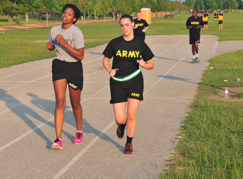 U.S. Army Reserve Spc. Chelsea Fleetwood runs with her pacer during her final lap of her APFT july 21, 2017, Ft. Gordon, Ga. Fleetwood trained hard for the test and expressed her excitement after passing.
