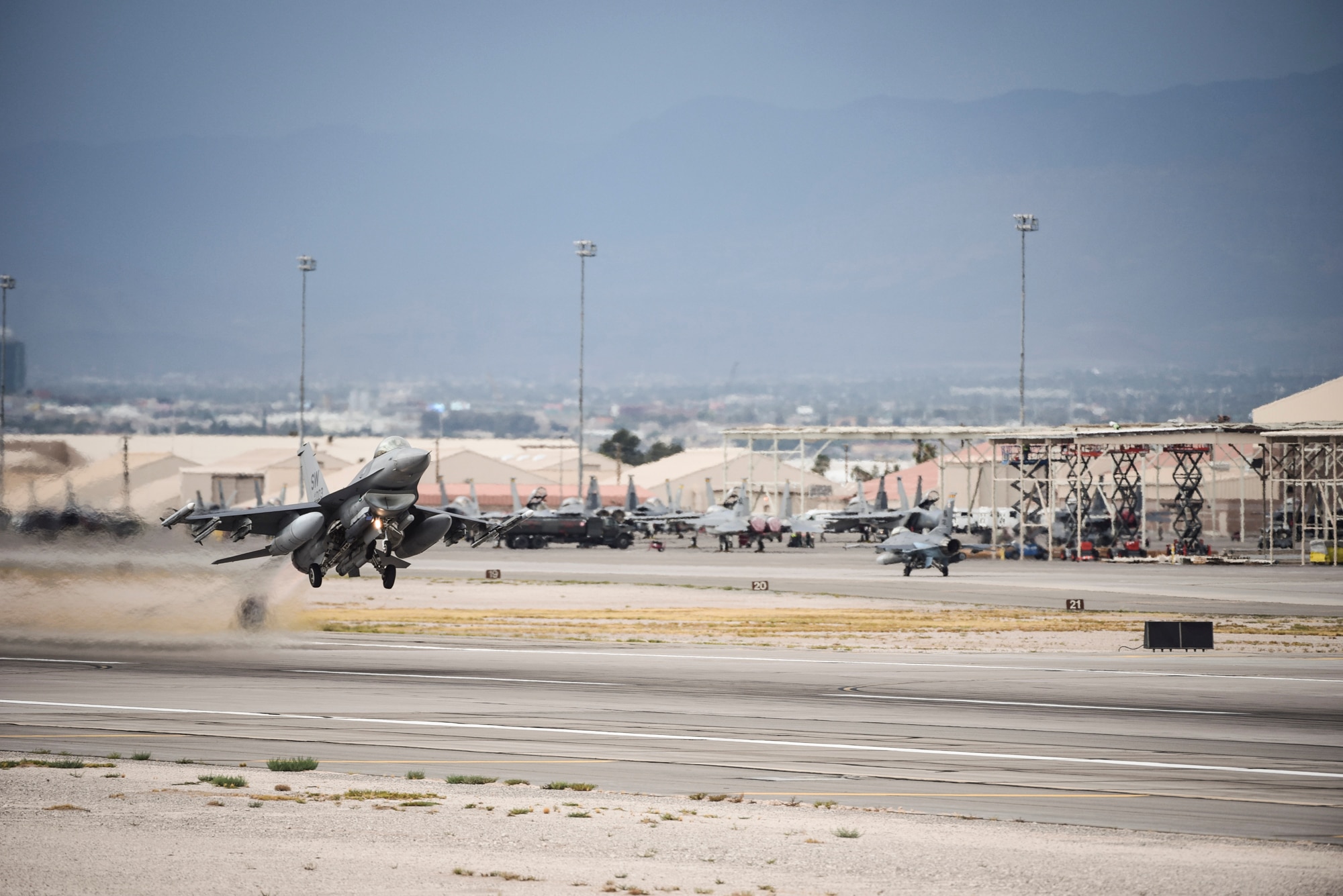 An F-16 Fighting Falcon from the 55th Fighter Squadron, Shaw Air Force Base, S.C., takes off from the runway at Nellis Air Force Base, Nev., during Red Flag 17-3 July 24, 2017. More than 2,500 military personnel came to Nellis AFB to participate and hone their skills during Red Flag 17-3. (U.S. Air Force photo by Airman 1st Class Andrew D. Sarver/Released)