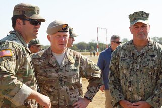 A U.S. Army Special Forces Soldier details many of Fuerzas Comando’s events to U.S. Special Operations Command Commander, Army Gen. Raymond A. Thomas III (center), and Navy Rear Adm. Collin Green, Commander, Special Operations Command South, July 24, 2017, in Vista Alegre, Paraguay. The multinational competition promotes cooperation and furthers interoperability between participating countries. (U.S. Army photo by Staff Sgt. Osvaldo Equite/Released)