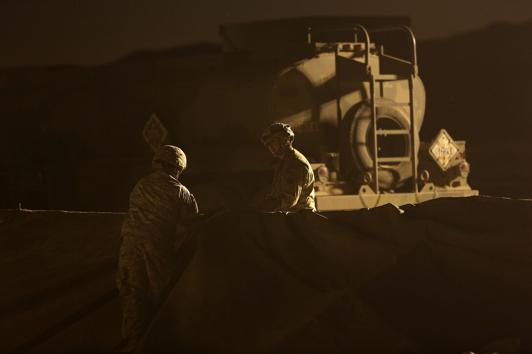 Soldiers of the 233rd Quartermaster Company from Philadelphia, set up a maintenance tent during Combat Support Training Exercise 91-17-03, July 18, 2017, Fort Hunter Liggett, Calif. Approximately 5,000 Army Reserve and National Guard forces participated in the exercise. First Army provided about 65 observer coach/trainers to augment their Army Reserve partners at the 91st Training Division and assist in training the most capable, combat-ready and lethal federal reserve force in the history of the nation.
(U.S. Army photo by Master Sgt. Anthony L. Taylor)