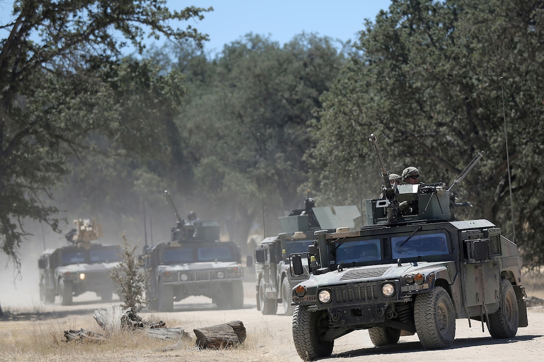 U.S. Army National Guard Soldiers of the 870th Military Police Company, based in Pittsburg, Calif., engage as a Quick Reactionary Force to an opposing force assault during Combat Support Training Exercise 91-17-03, July 18, 2017, at Fort Hunter Liggett, Calif. Approximately 5,000 Army Reserve and National Guard forces participated in the exercise. First Army provided about 65 observer coach/trainers to augment their Army Reserve partners at the 91st Training Division and assist in training the most capable, combat-ready and lethal federal reserve force in the history of the nation.
(U.S. Army photo by Master Sgt. Anthony L. Taylor)