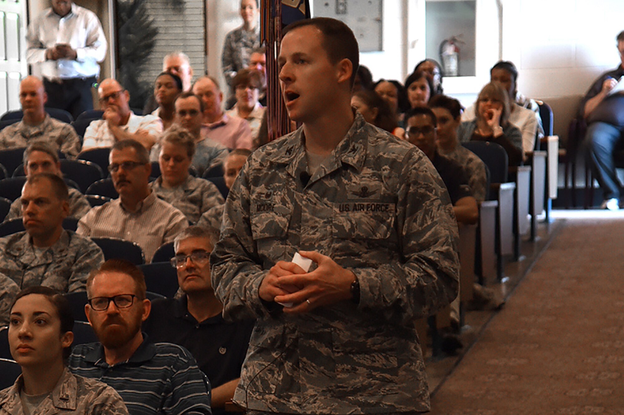 PETERSON AIR FORCE BASE, Colo. - Col. Todd Moore, 21st Space Wing commander, held his first commander’s call in the base auditorium at Peterson Air Force Base, Colo., July 21, 2017. Moore projected his vision for the future of the wing to fellow Airmen. (U.S. Air Force photo by Robb Lingley)