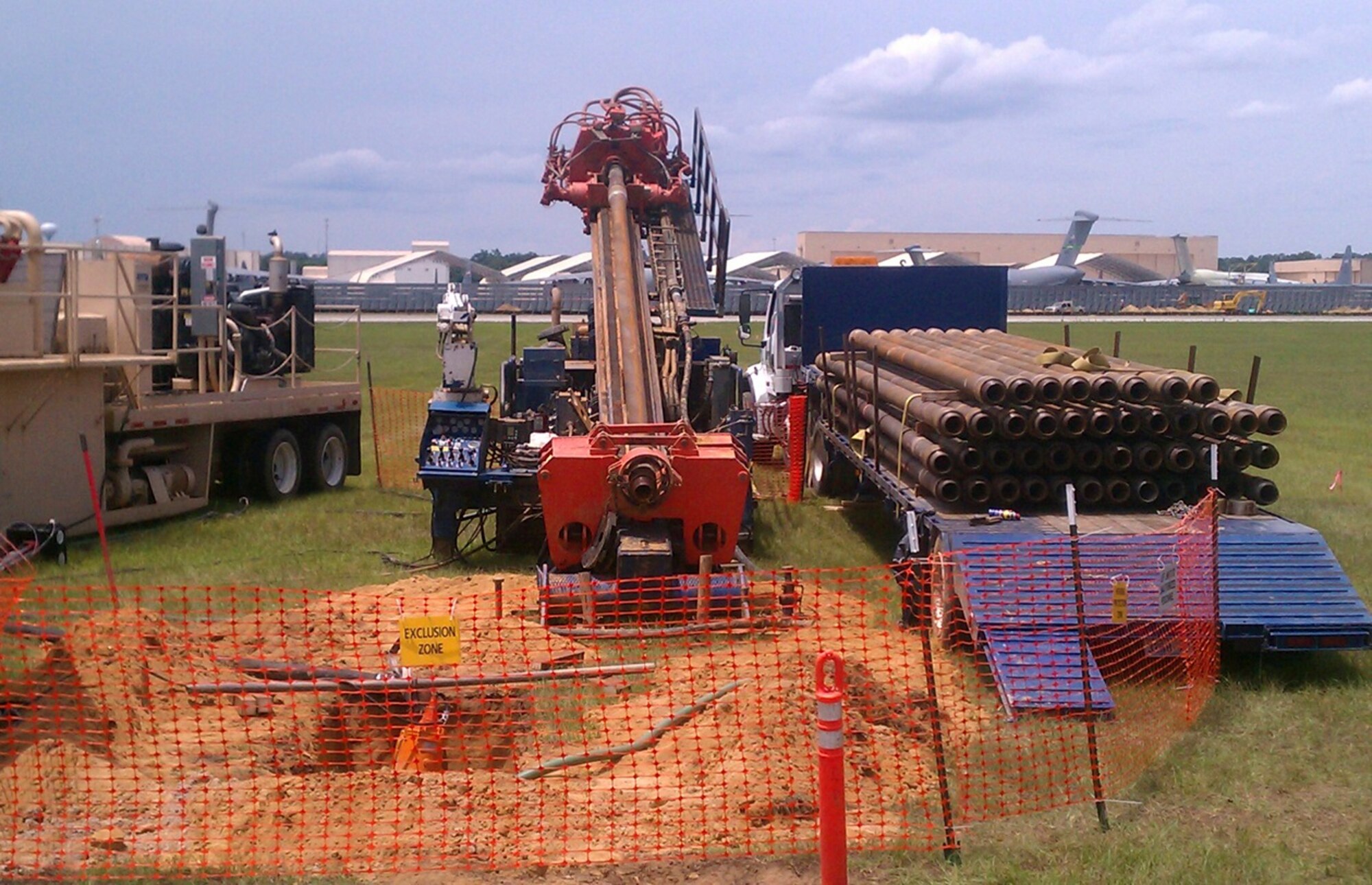 Contractors install a directionally drilled, horizontal sparge well under an airfield at Robins Air Force Base, Georgia, to clean up a fuel contaminated groundwater plume. A sparge well injects air into a groundwater table which bubbles up through contaminated water, stripping contaminates out and restoring the site to regulatory levels. In addition to helping the base develop a work plan and obtain necessary permits and waivers, the Air Force Civil Engineer Center installation support section on Robins oversaw the construction and long-term operation of the remediation system. (Courtesy photo)