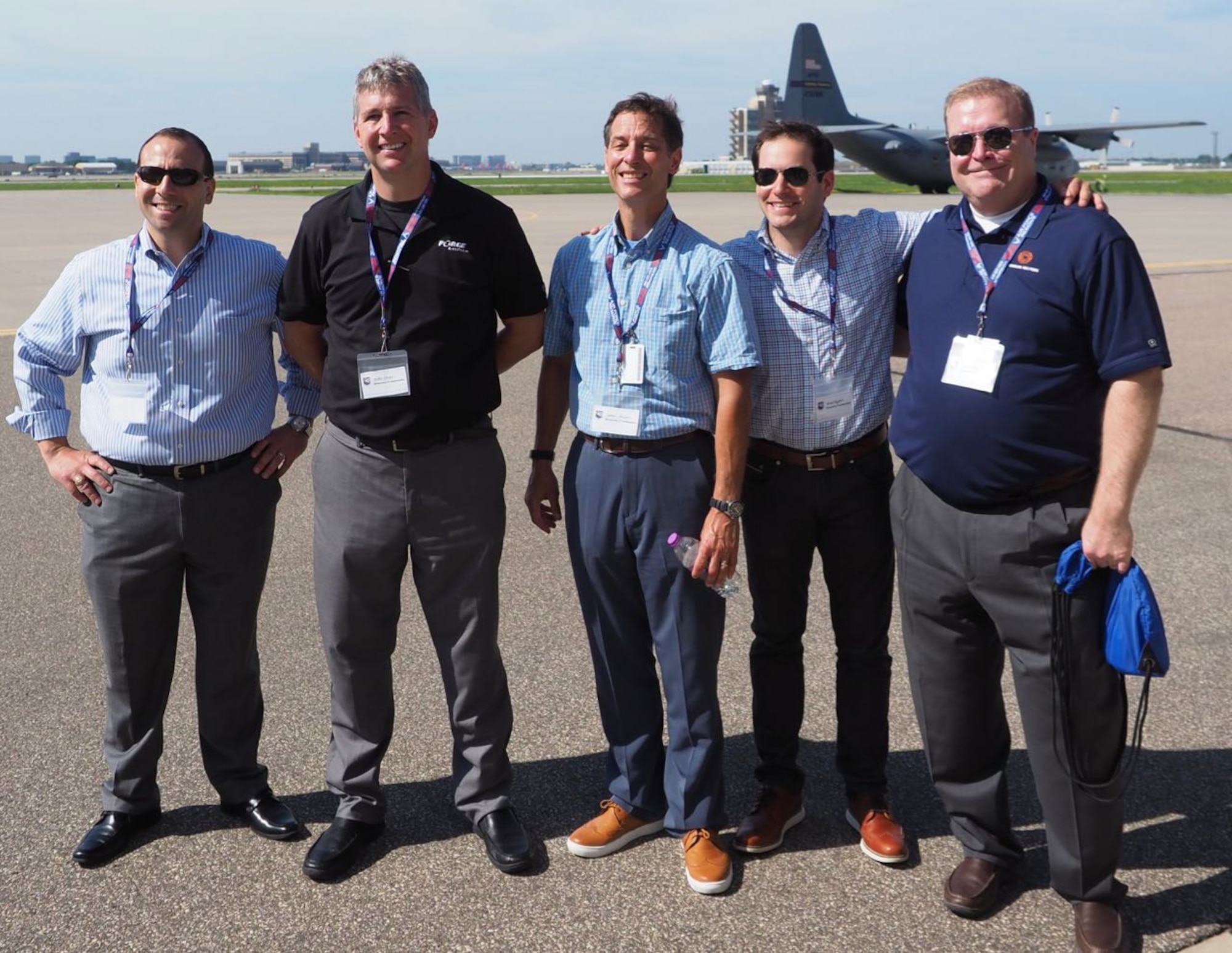 From left, Honorary Commanders Chris Passaro, John Stenz, James Meyer, Brad Ingber and Rick King visit the 934th Airlift Wing flightline. (Air Force Photo/Paul Zadach)