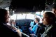 Col. Tony Polashek (right) 934th Airlift Wing commander, talks with Honorary Commanders in the cockpit of a C-130.
(Air Force Photo/Paul Zadach)