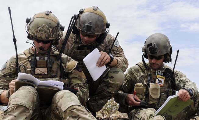 Joint terminal attack controllers communicate with an A-10 Thunderbolt II attack aircraft pilot via radio during a training exercise on the Nevada Test and Training Range July 19, 2017.  JTACs direct aircraft for use during close-air support and offensive operations from a forward position. (U.S. Air Force photo by Senior Airman Kevin Tanenbaum/Released)