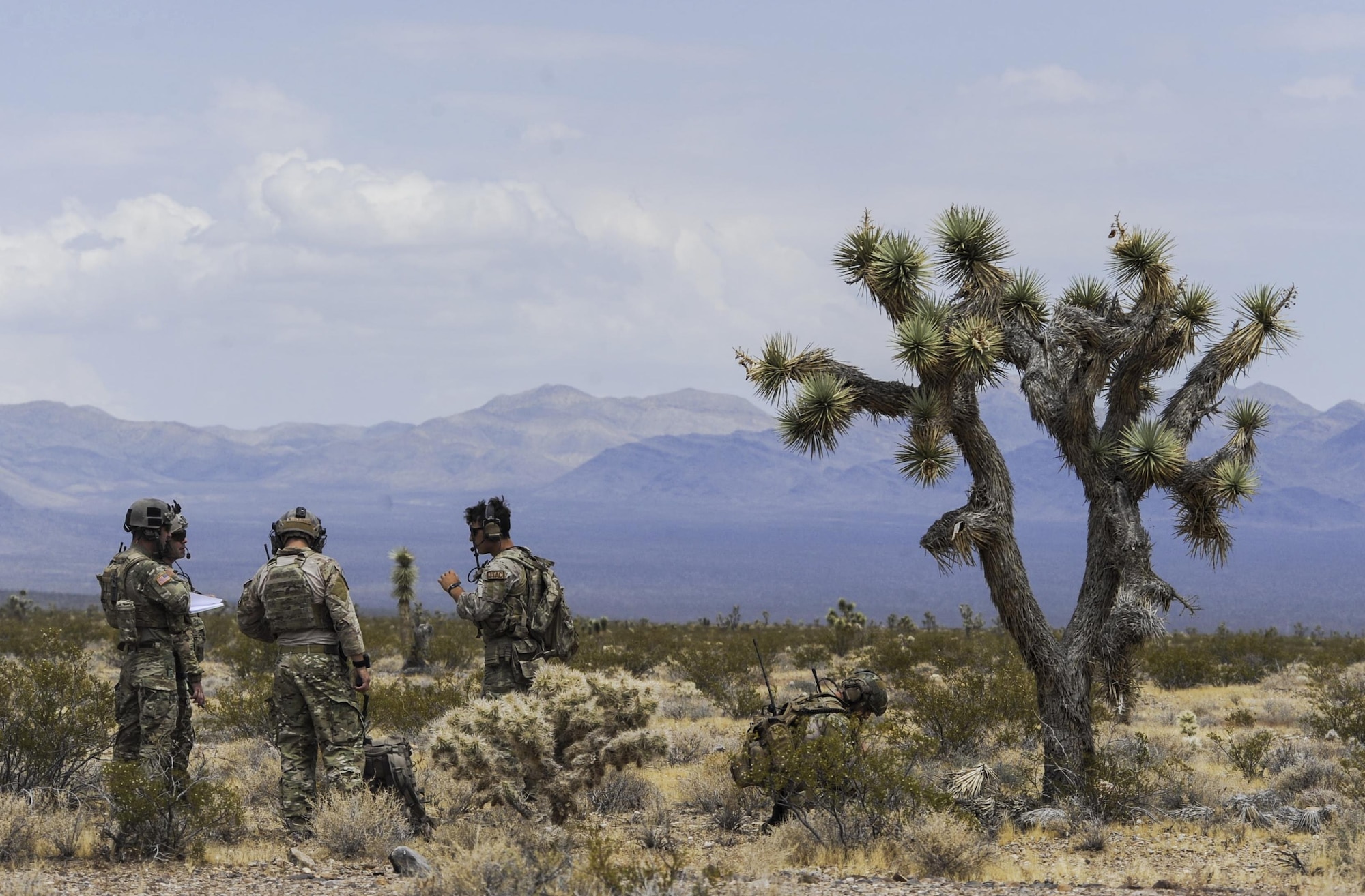 Joint terminal attack controllers prepare for a simulated training exercise on the Nevada Test and Training Range July 19, 2017. JTACs integrates air power into ground special operations for mission success, deploying into forward hostile areas to control offensive airstrike operations. (U.S. Air Force photo by Senior Airman Kevin Tanenbaum/Released)