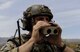 A joint terminal attack controller surveys a simulated convoy during a training exercise on the Nevada Test and Training Range July 19, 2017.  JTACs direct the action of combat aircraft engaged in close-air support and other offensive air operations from a forward position. (U.S. Air Force photo by Senior Airman Kevin Tanenbaum/Released)