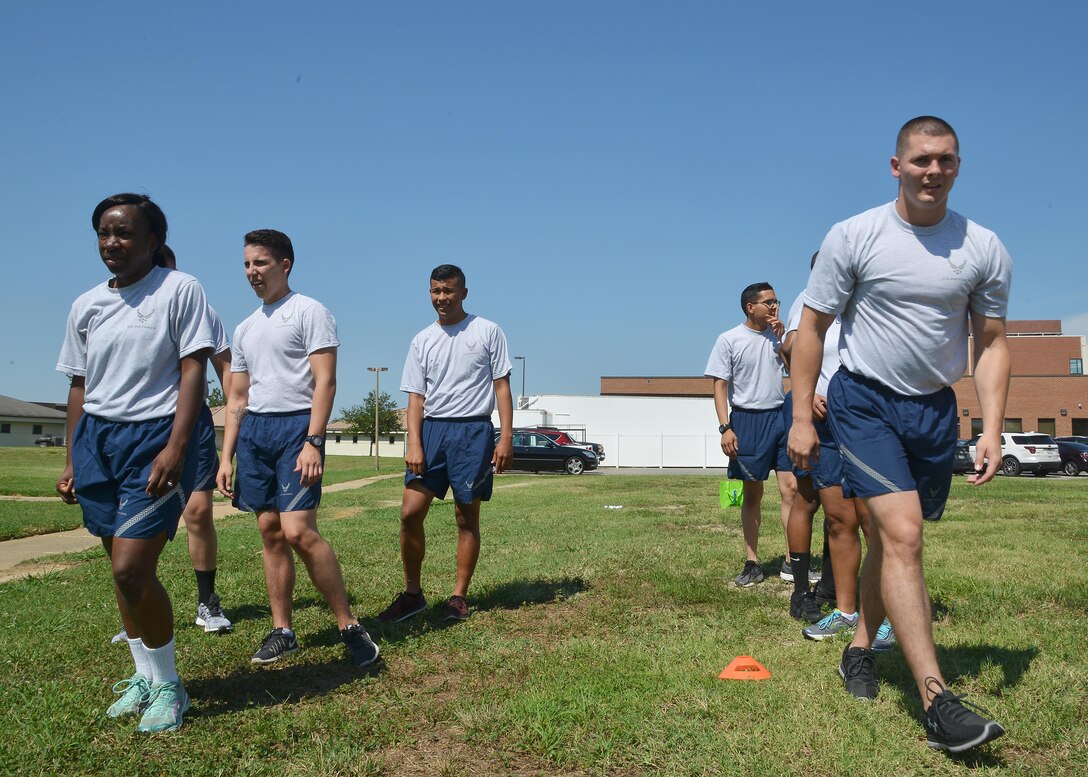 U.S. Air Force Airmen taking the First Term Airman Course prepare to start an obstacle course during physical training at Joint Base Langley-Eustis, Va., July 19, 2017. The new FTAC will involve more team physical training to help Airmen with their team-building skills. 
