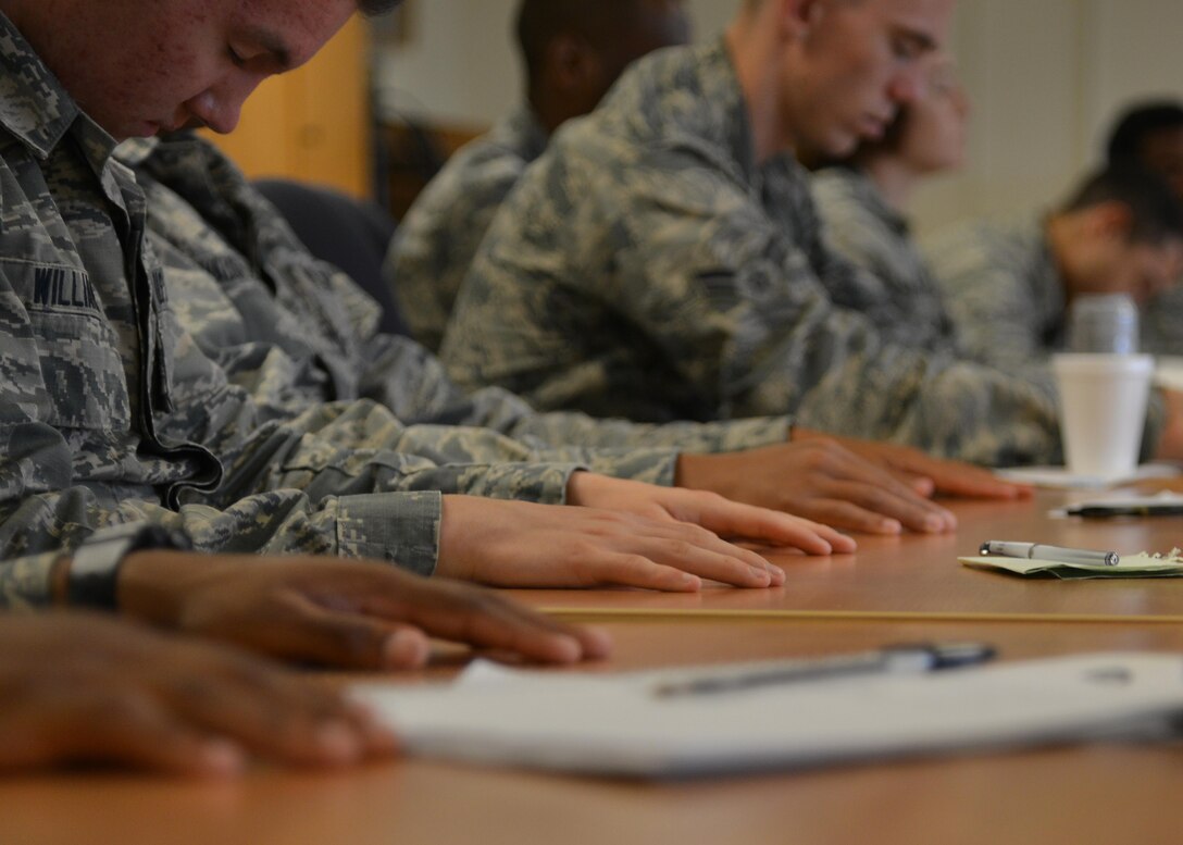 U.S. Air Force Airmen enrolled in the First Term Airman Course practice meditation, as a resiliency skill, to combat stress at Joint Base Langley-Eustis, Va. July 20, 2017. The course has new objectives such as enhancing human capital, personal financial management, resiliency training, team building exercises, physical training, and “What Now, Airman?” scenarios to develop Airman professionally to support warfighters. 